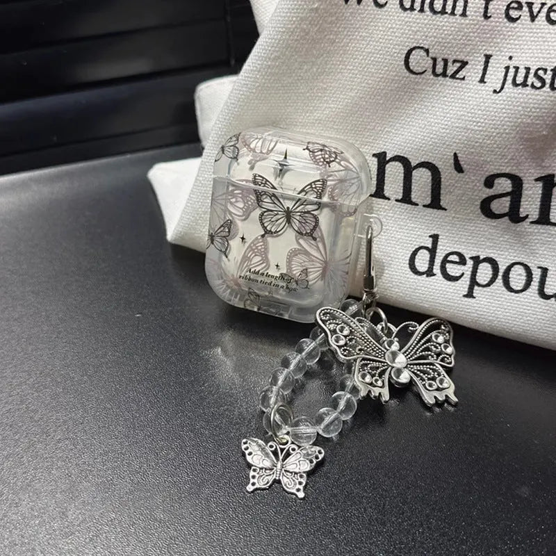 Butterfly TPU protective cover for AirPods with beaded pendant and embossed cartoon design