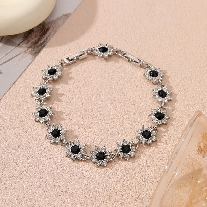Flower-shaped zinc alloy bracelet with electroplated finish and colourful crystal accents