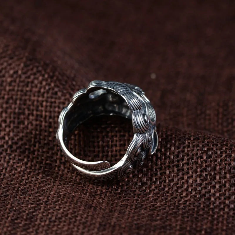 Silver open ring with domineering Jibeast animal Zodiac pattern and diamond detail.