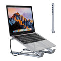 Aluminium folding laptop stand with 8-in-1 docking station hub showing connectivity ports