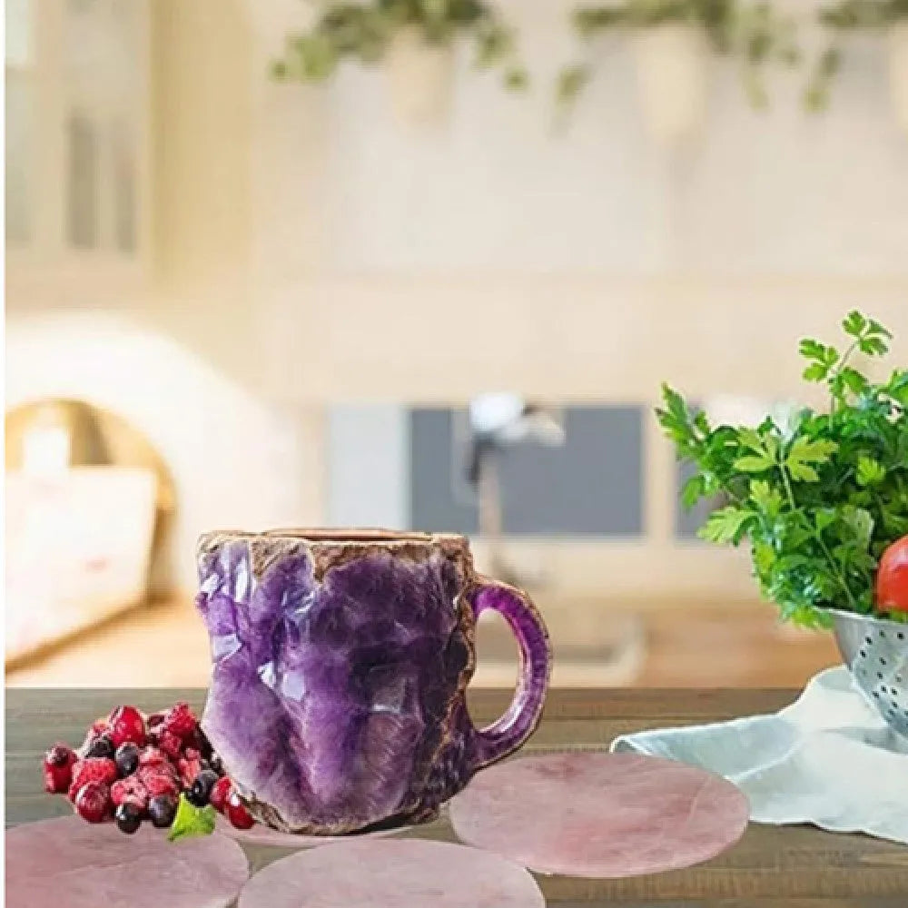 Purple resin coffee mug with handle showing crystal-like transparency on a table.