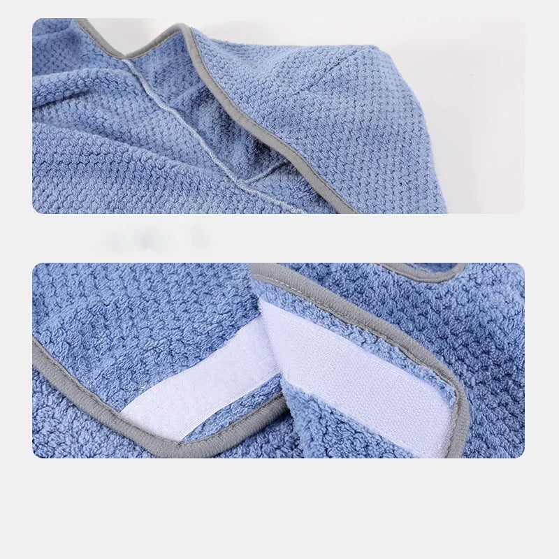 Blue adjustable dog bath robe towel wrapped around a dog, showing sizing chart for XS, S, M, L, and XL.