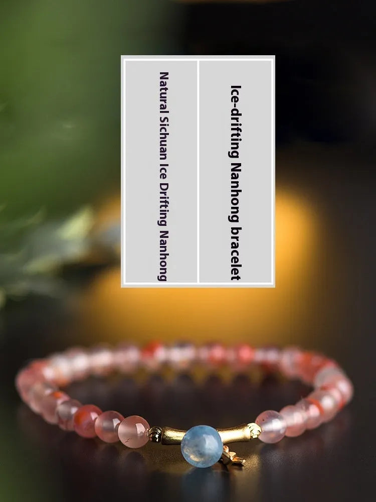 Ice float nanhong agate ethnic bracelet with bamboo joint links and flower decoration in hetian jade colour
