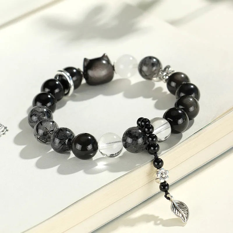 Silver stone crystal beaded bracelet with electroplated setting and choice of fox, cat or planet pendant
