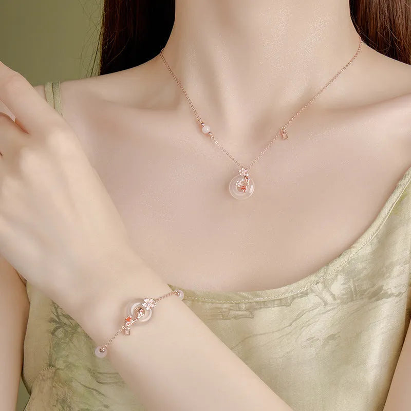 S925 sterling silver bracelet with white chalcedony crystal charm and koi fish design.