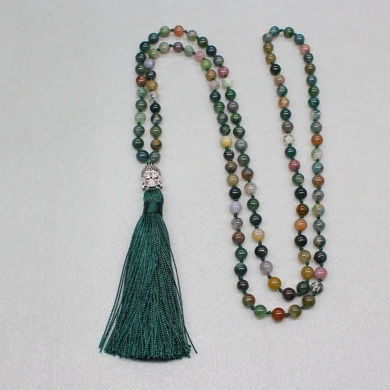 Natural agate bracelet with 108 geometric beads, each measuring 6mm, laid flat.