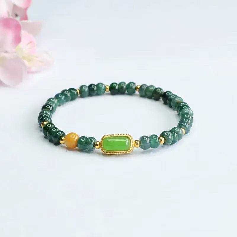 Natural stone blue water jade abacus bead bracelet with geometric design and metal spacers