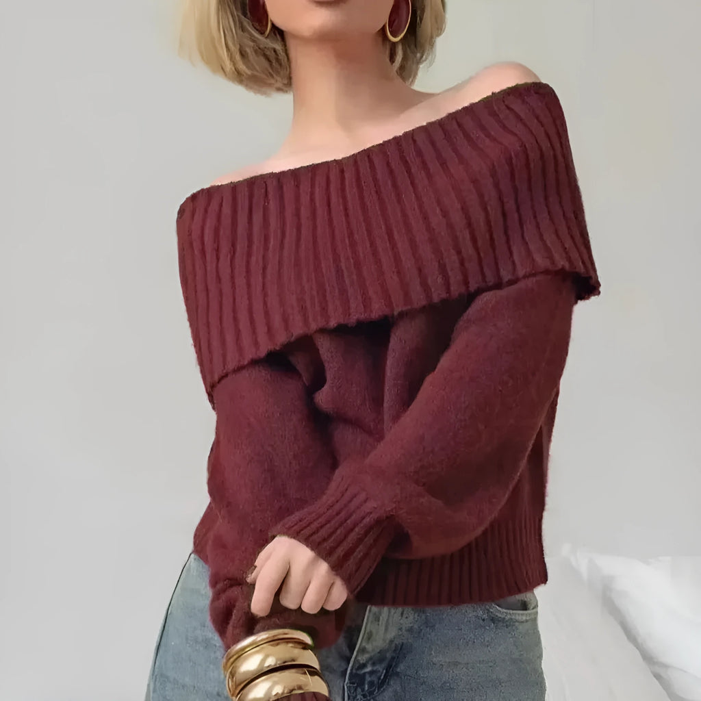 Grey off-the-shoulder women's sweater with a 3D pattern and regular sleeves on a hanger.