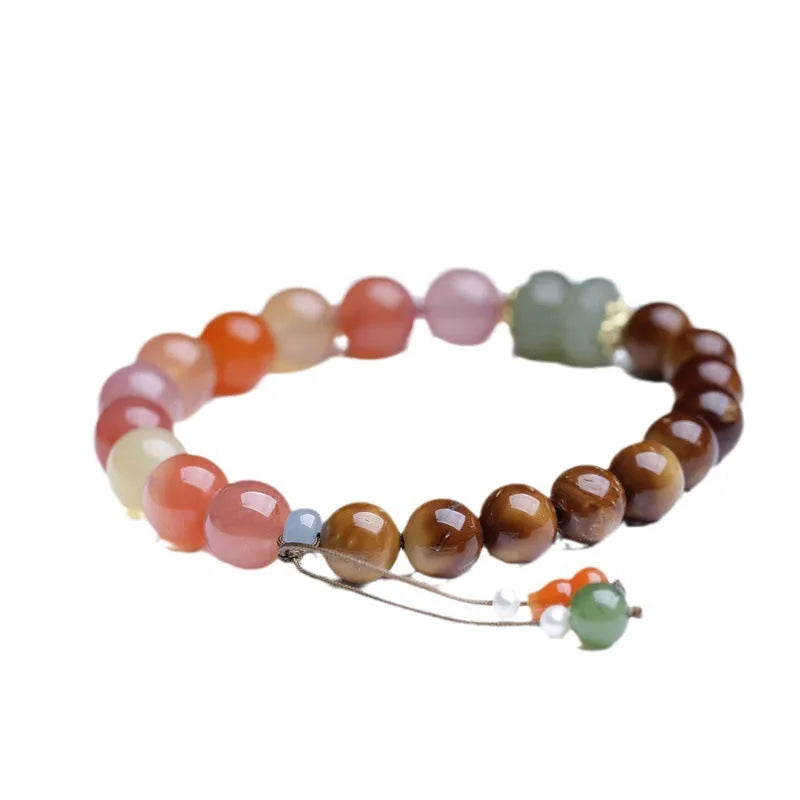 8mm diamond-shaped agate bracelet with natural persimmon colouration on woman's wrist