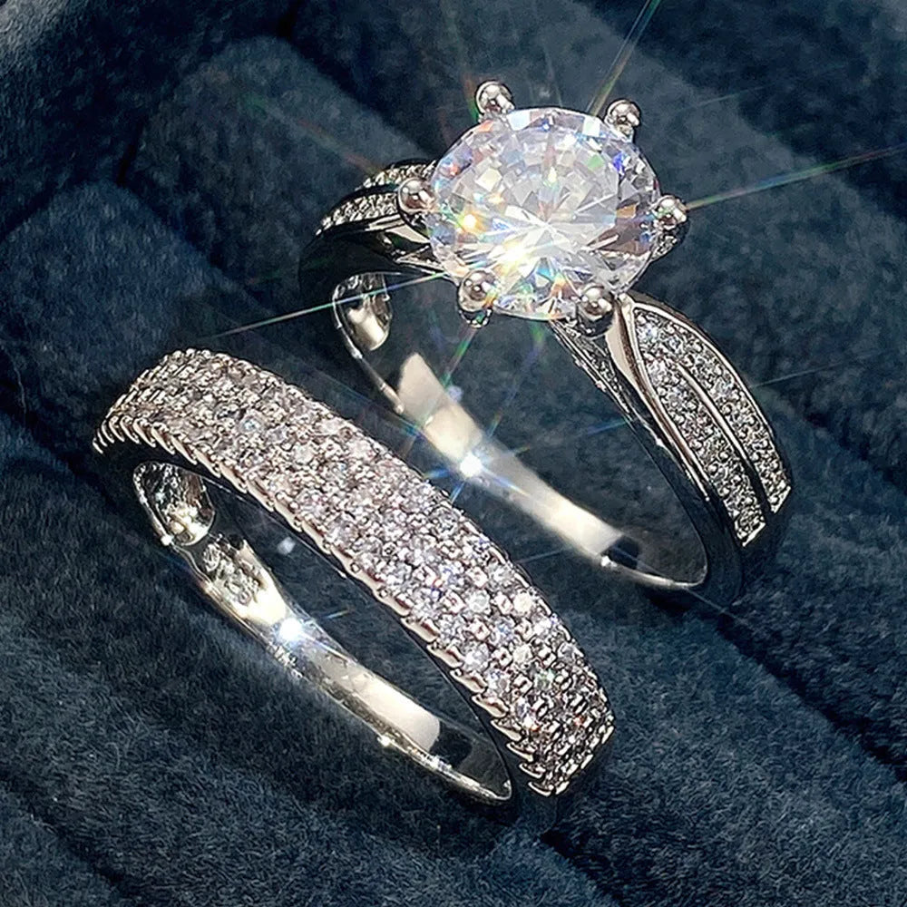 White gold geometric combined wedding ring and simple bracelet on size display.
