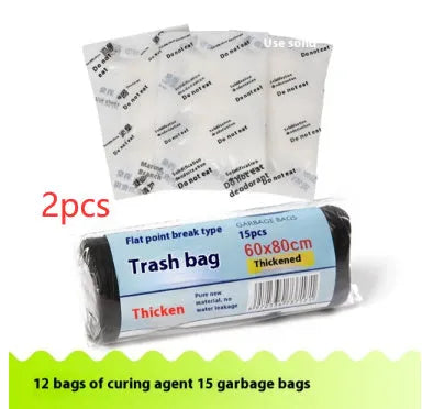 Disposable emergency urine bag kit with black degradable bags and curing agent sachets.