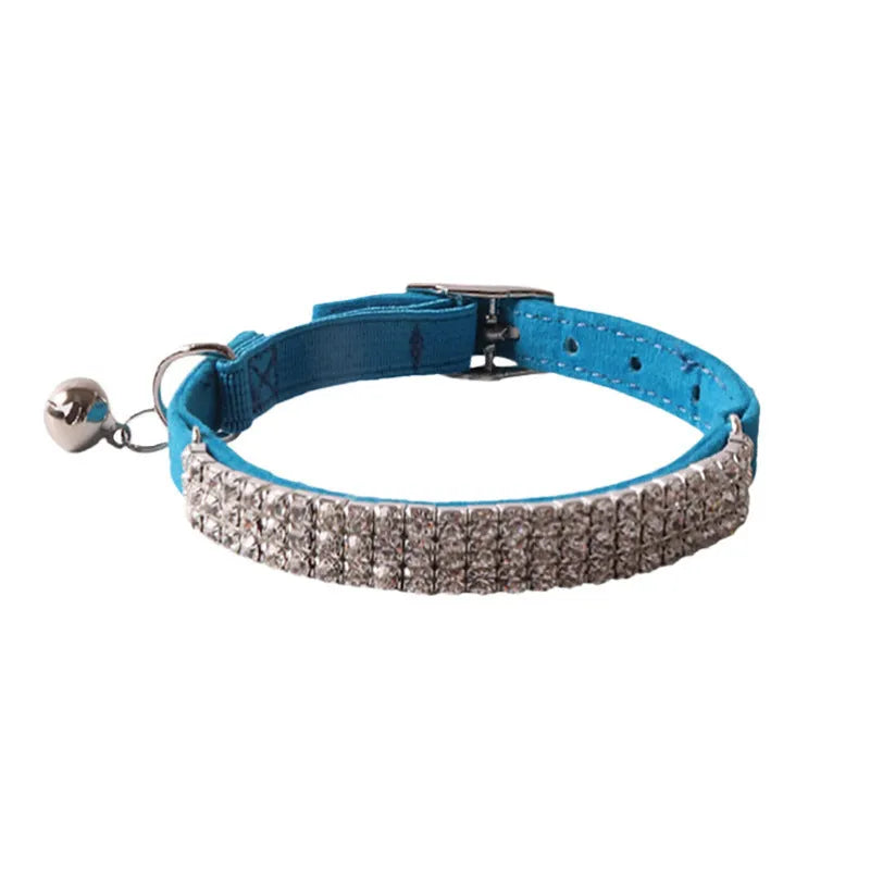 Flannel cat collar with buckle and elastic, shown in multiple colour options.
