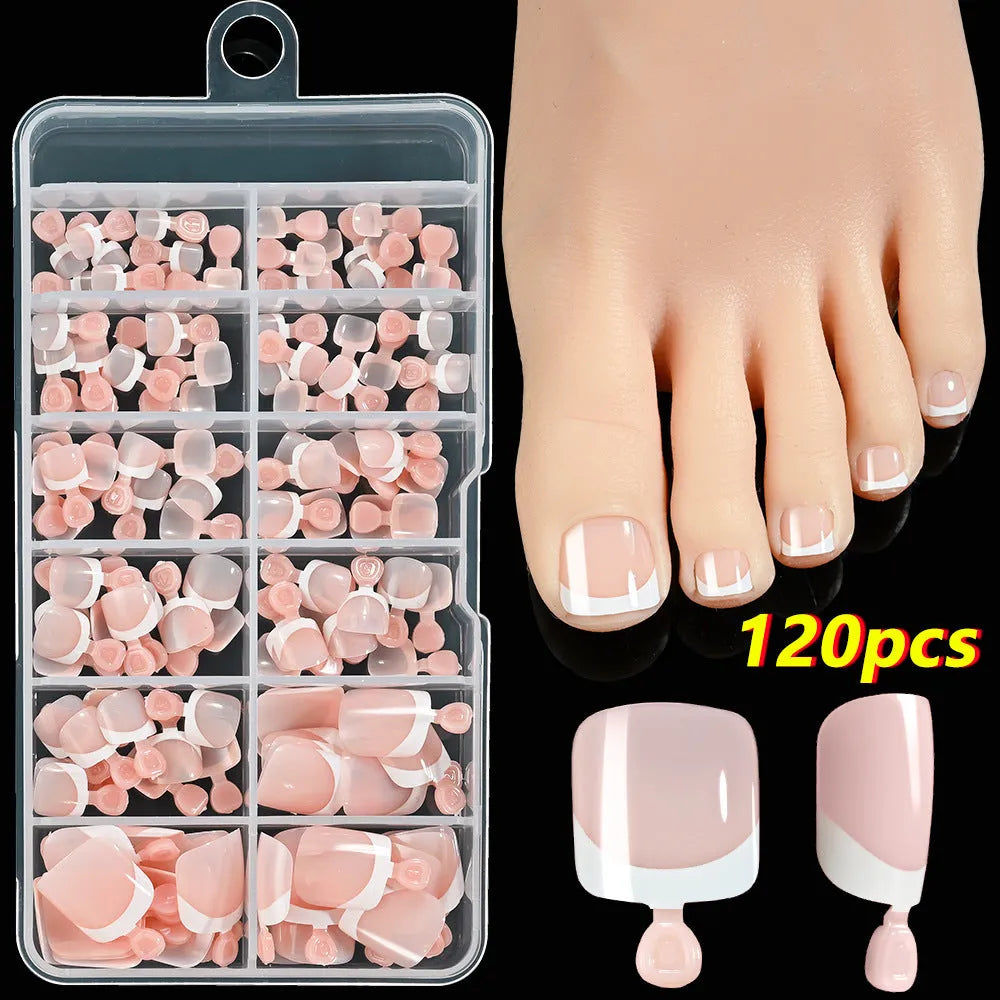 Box of 120 French white edge square short artificial nail pieces in multiple nude shades