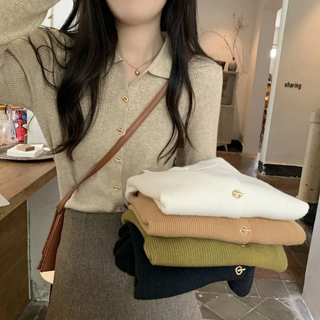 Women's beige knitted cardigan top with long sleeves shown open as a layering piece