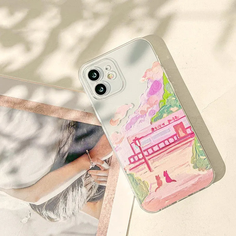 Soft silicone iPhone case with a cartoon-style two cats design on the back.