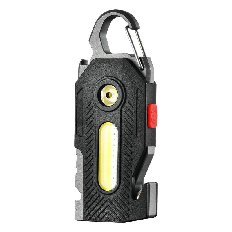 Multifunctional charging emergency light with COB high brightness, mountaineering buckle, and bottle opener on a keychain