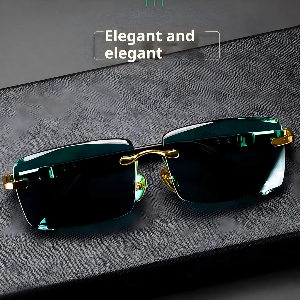 Frameless dark green sunglasses with a crystal aesthetic style, shown with a matching case and lens cloth.