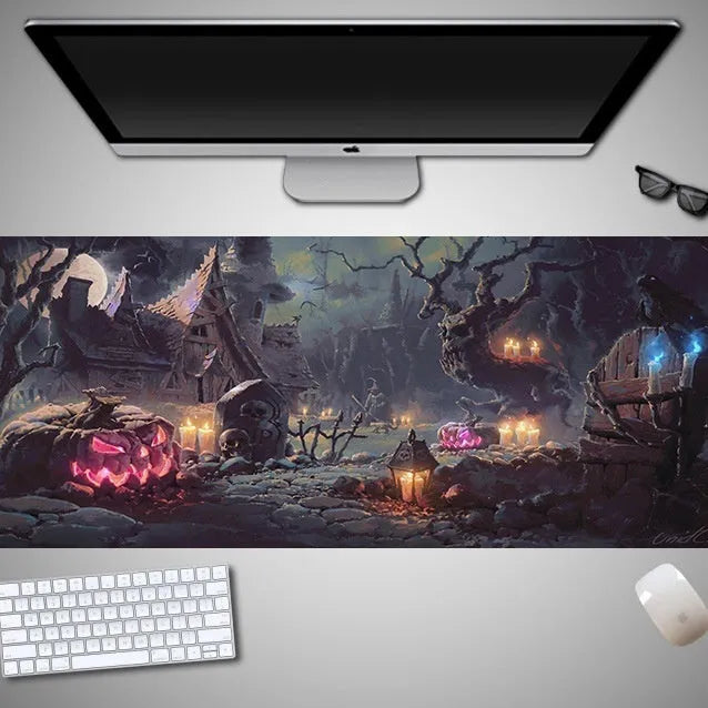 Oversized Halloween-themed rubber cloth gaming mouse pad on a desk.