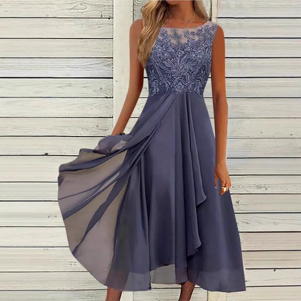 Women's sleeveless green chiffon dress with lace hollow-out detailing on a mannequin.