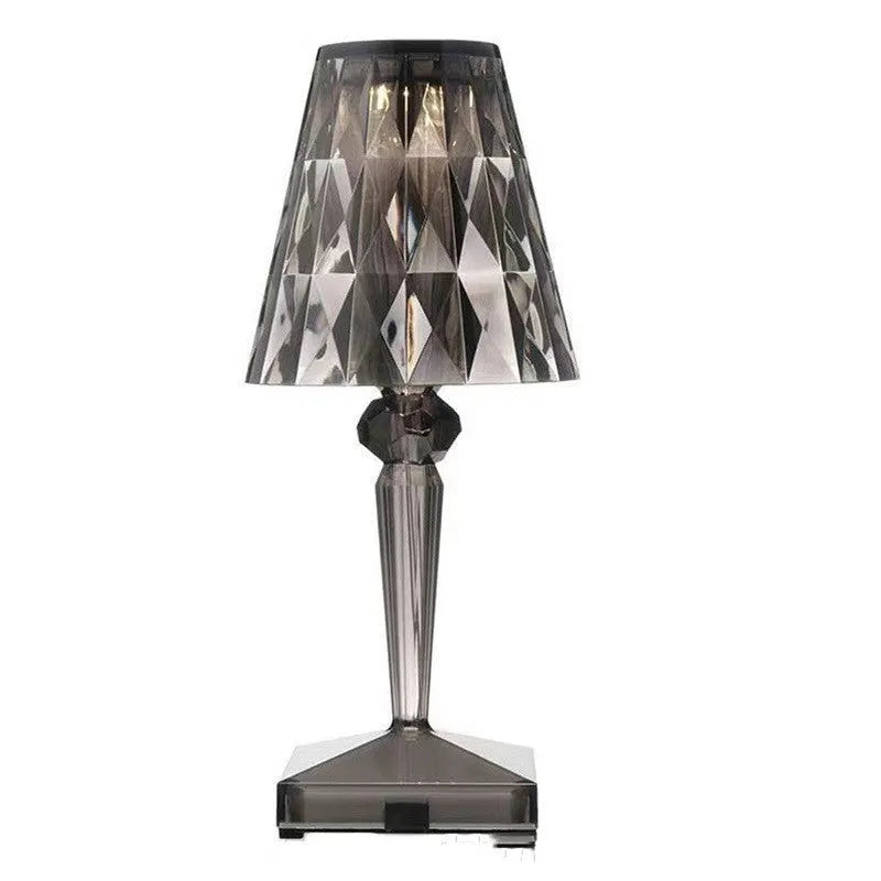 Rose gold portable touch night light on a surface, showing its acrylic construction and modern design.