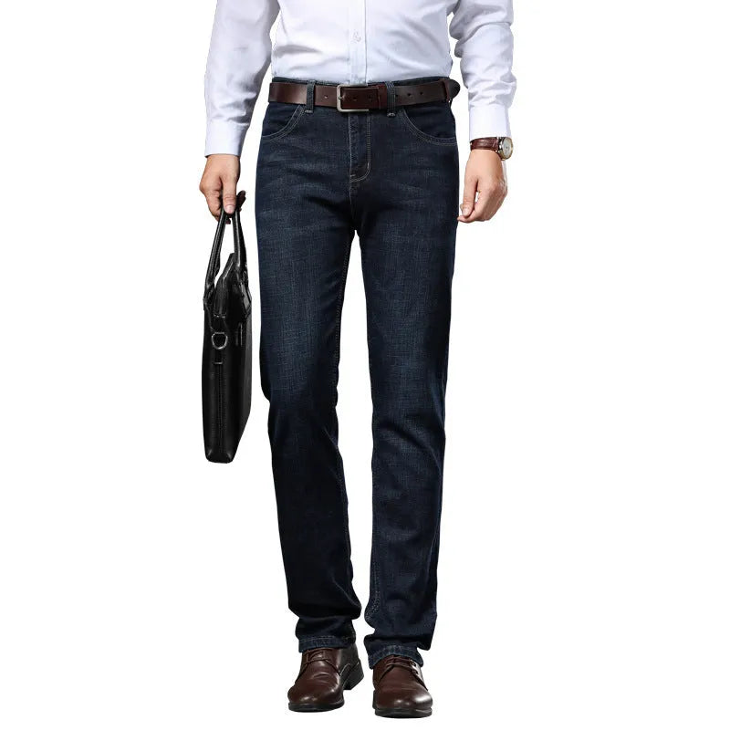 Straight leg stretch jeans in blue denim on a mid-waist model, showing zip fly and high elasticity fabric.
