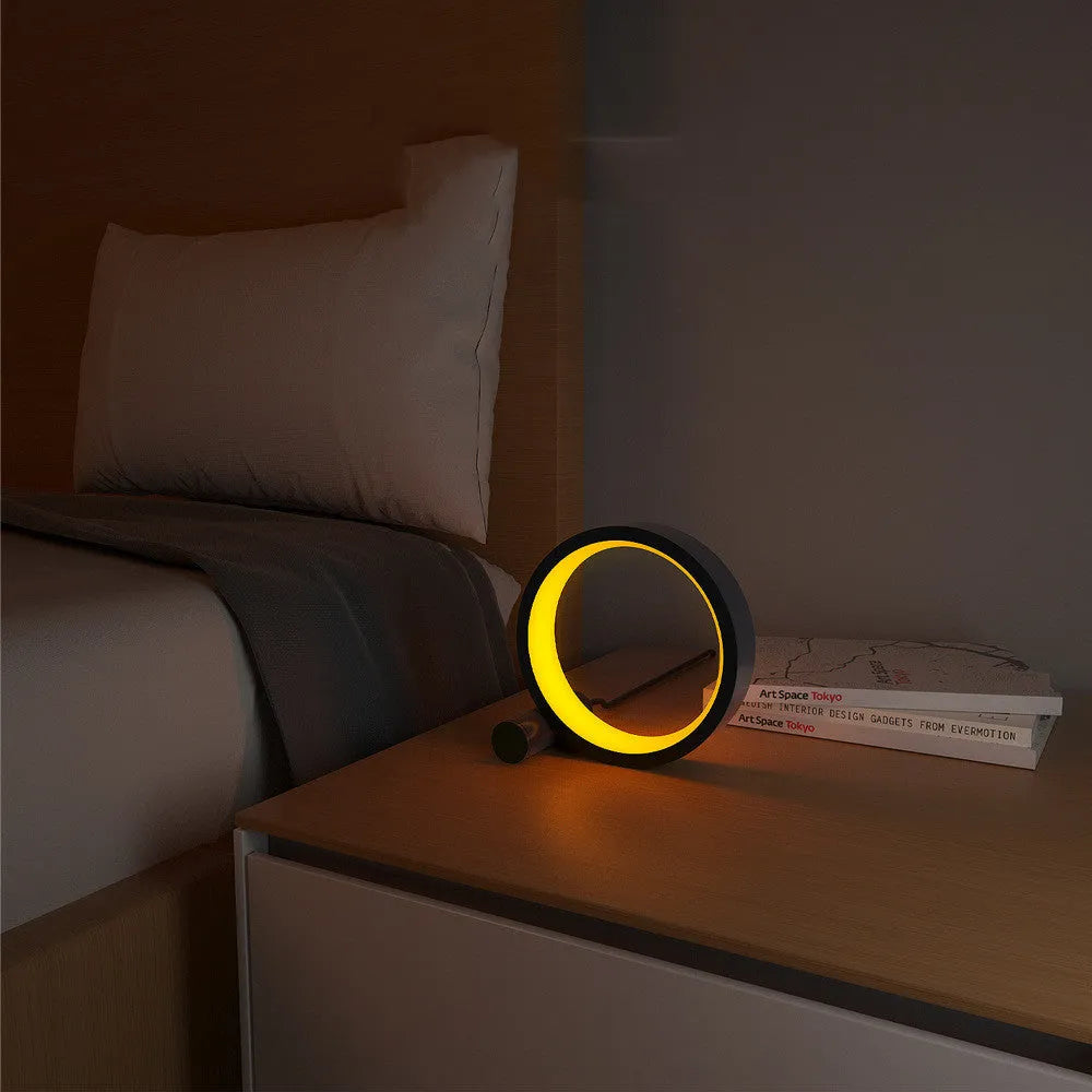 Modern aluminium smart LED atmosphere light with colourful projection, showing app and music control.
