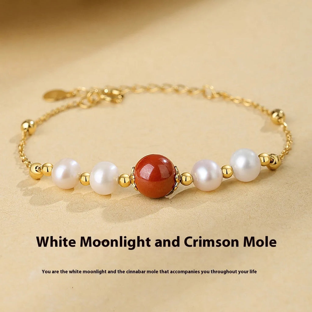 Yellow cinnabar charm on a silver 925 adjustable bracelet chain for women