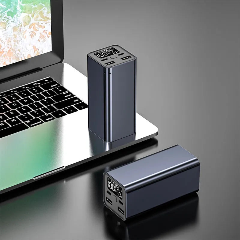 Black metal 65W high-power laptop charging bank showing size and USB-C port.