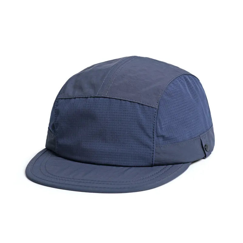 A breathable baseball cap with mesh panels and a soft tongue in army green colour.
