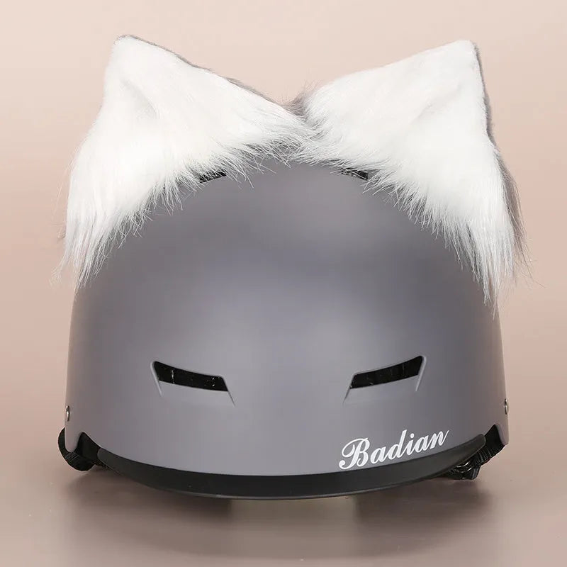 Plush cartoon-themed cover set on a medium motorcycle helmet with soft ear decorations.