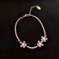 Women's gold copper bracelet with geometric quadrilateral design and zircon inlaid treatment