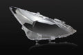 Mazda 3 Exela large headlamp cover replacement part with tube of snake glue adhesive.
