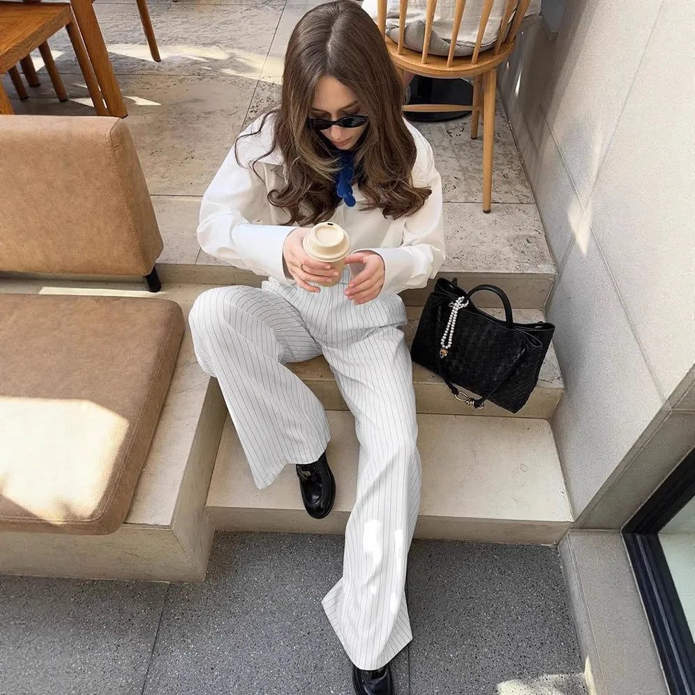 White striped wide-leg women's trousers with front zipper fastening for commuting