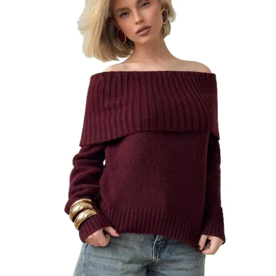 Grey off-the-shoulder women's sweater with a 3D pattern and regular sleeves on a hanger.