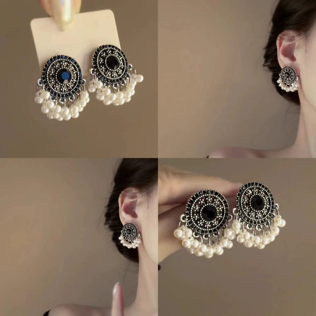 Pair of Miao maiden pearl earrings in round geometric shape with electroplating finish