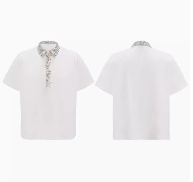 Women's loose black shirt with sequined square neckline and short sleeves on a hanger.