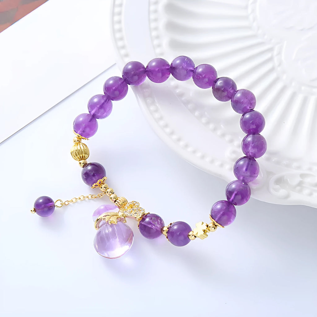 Purple amethyst bracelet with money bag pendant and adjustable cord