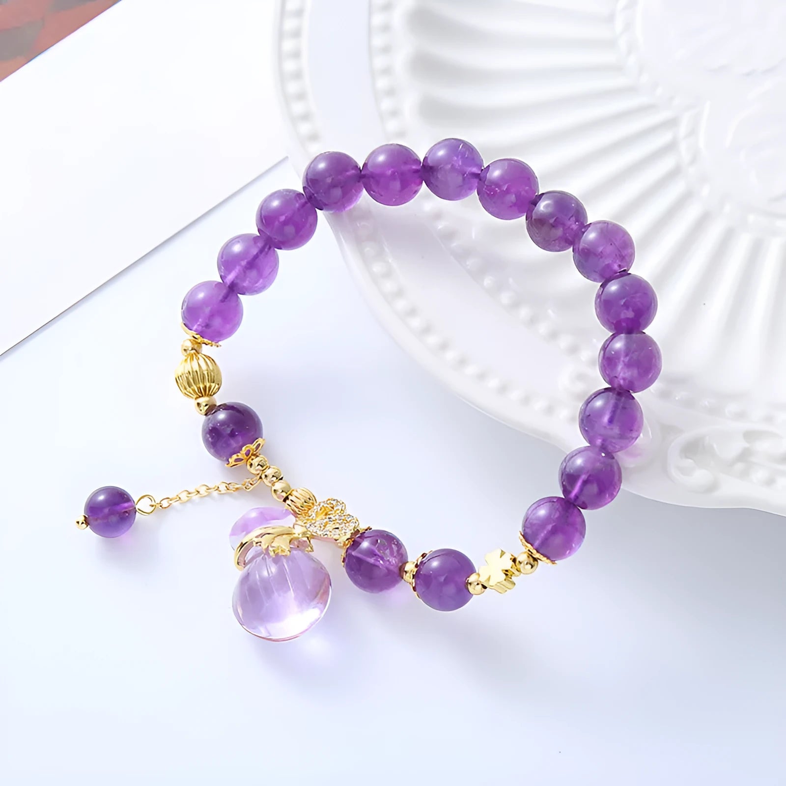 Purple amethyst bracelet with money bag pendant and adjustable cord