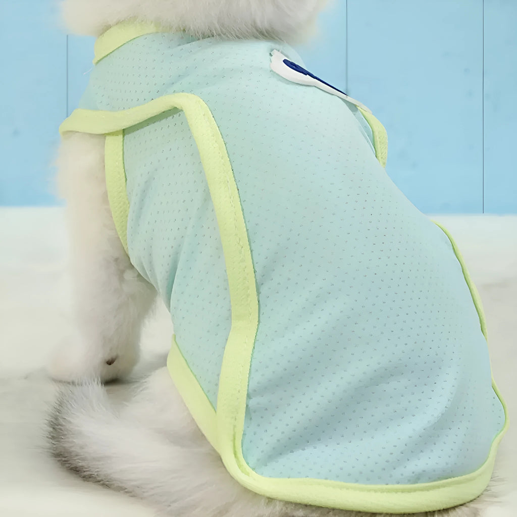 Grass green polyester summer vest for a cat on a mannequin.