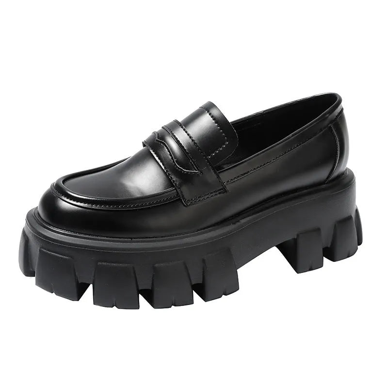 British style wide fit loafers with chunky rubber sole and muffin heel in patent leather.