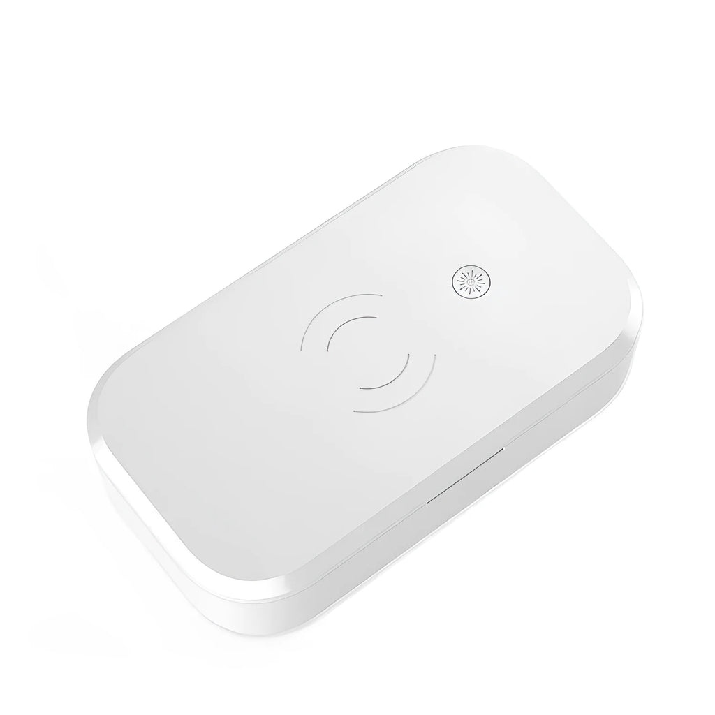 White ultraviolet disinfection box with wireless phone charging pad on top