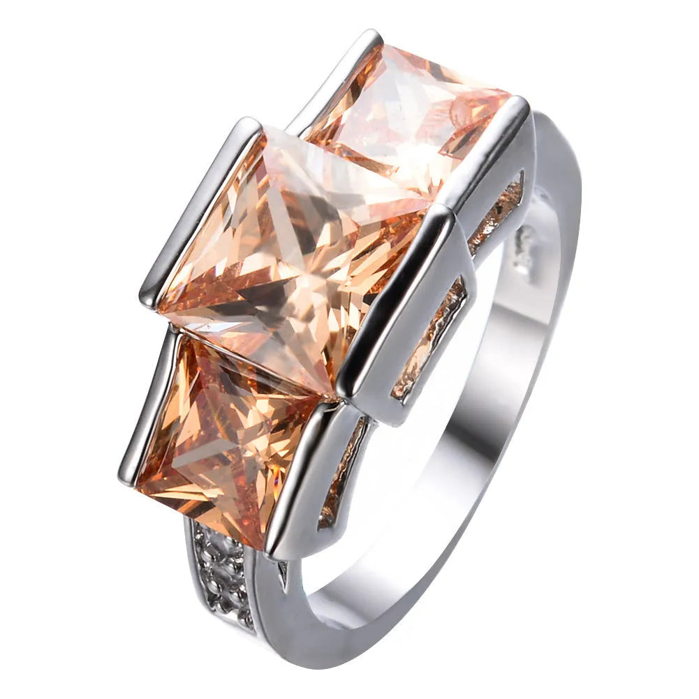 A colourful electroplated copper women's ring with a geometric design, shown in multiple colour options.