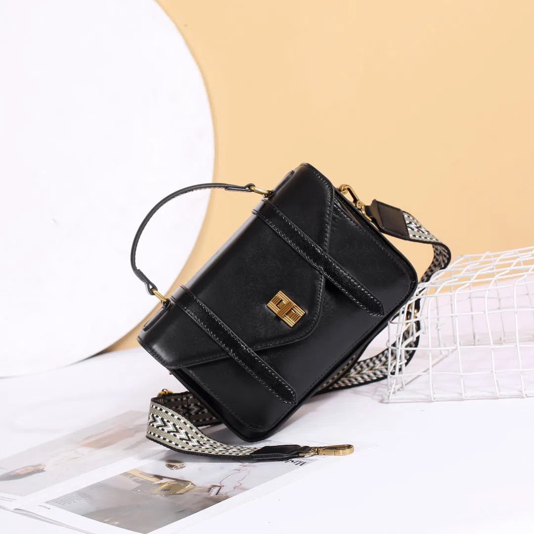 Full-grain vegetable-tanned cowhide tote bag in horizontal rectangular shape with double shoulder straps, large capacity interior, available in five colours