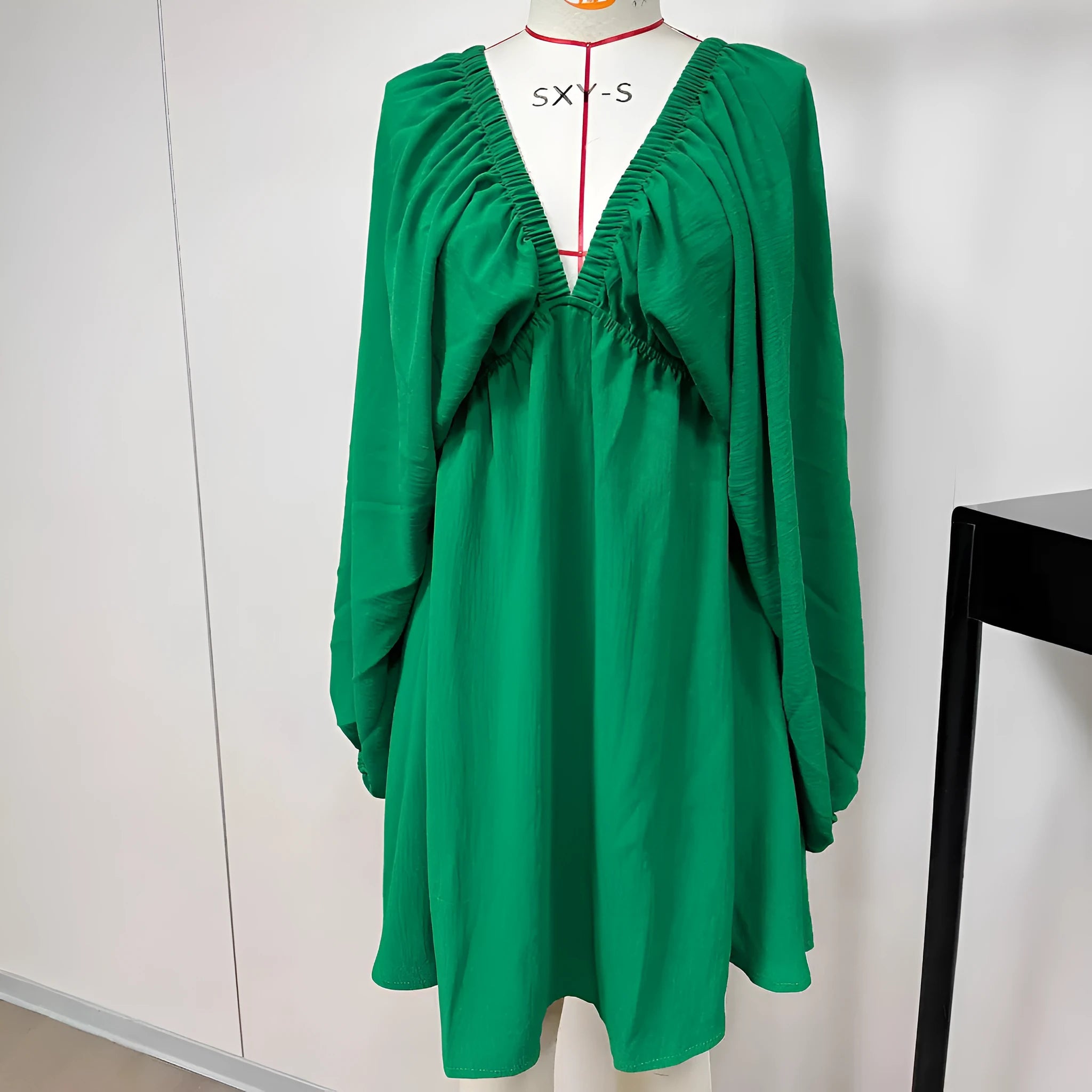 Women's polyester puff sleeve dress with V-neck and flounced swing skirt in apricot colour