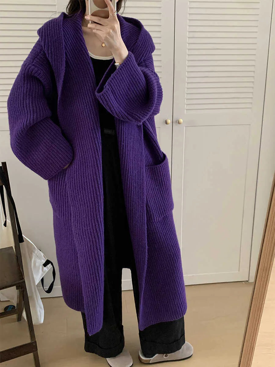 Women's loose grey hooded acrylic cardigan coat with long sleeves, shown open.
