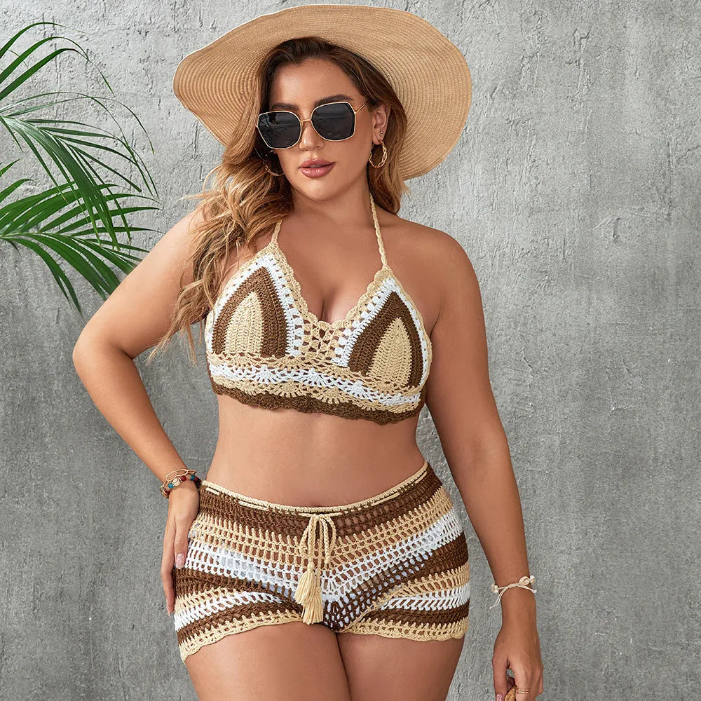 Blue women's plus size hollow out strap split swimsuit briefs on a white background.