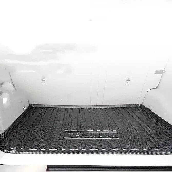 Black carbon fibre pattern TPE car trunk protector mat for vehicle boot floor.