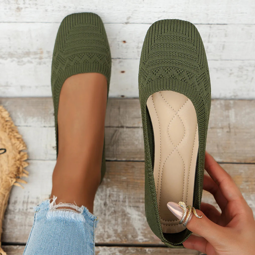 Women's knitted canvas slip-on shoes in black with flat heel and shallow mouth