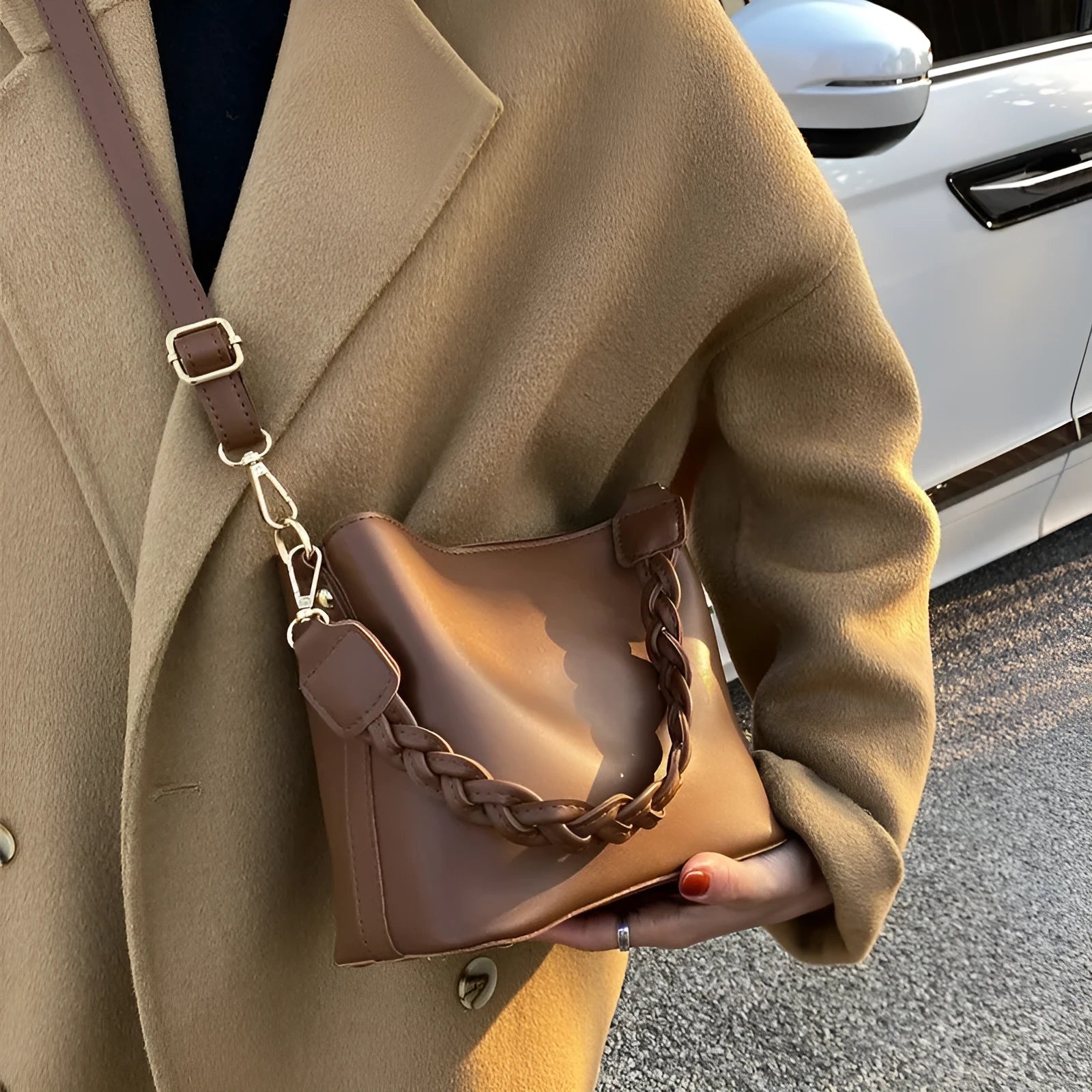 Khaki unisex PU crossbody bucket bag with woven texture and shoulder strap