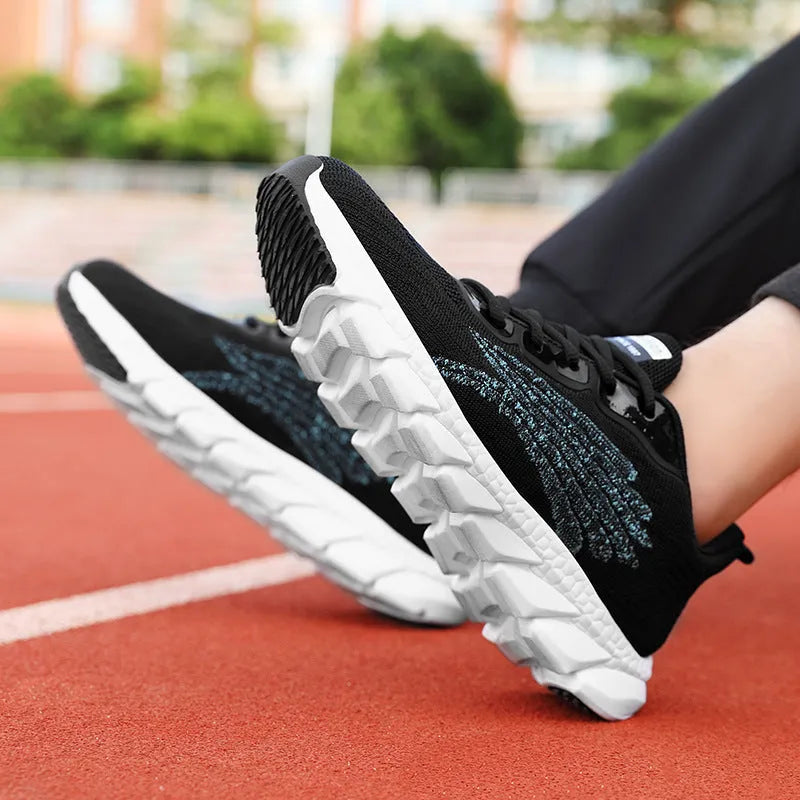 Low-top black and white running sneakers with cross-strap detail and a round toe on a flat MD sole.